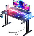 HLDIRECT 63 Inch Gaming Desk with 5 Sockets & LED Lights, Computer Gamer Desk with Monitor Stand, Ergonomic Carbon Fiber Gaming Table Home Office Desk with Cup Holder, Headphone Hook & Mouse Pad