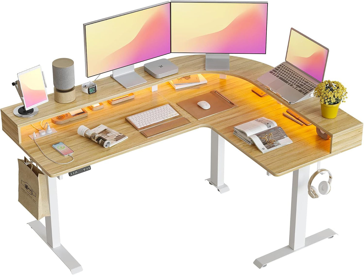 FEZIBO Triple Motor L Shaped Stadning Desk with LED Strip & Power Outrlets，63 inches Height Adjustable Stand up Corner Desk with Ergonomic Monitor Stand, White Frame/Natural Top