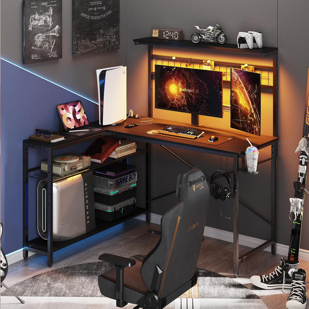 Bestier Gaming Desk 51' L-Shaped, with Power Outlets & LED Lights- 4 Tier Shelves, Reversible Gamer Table with Hooks & Cup Holder for Home Office Carbon Fiber Black