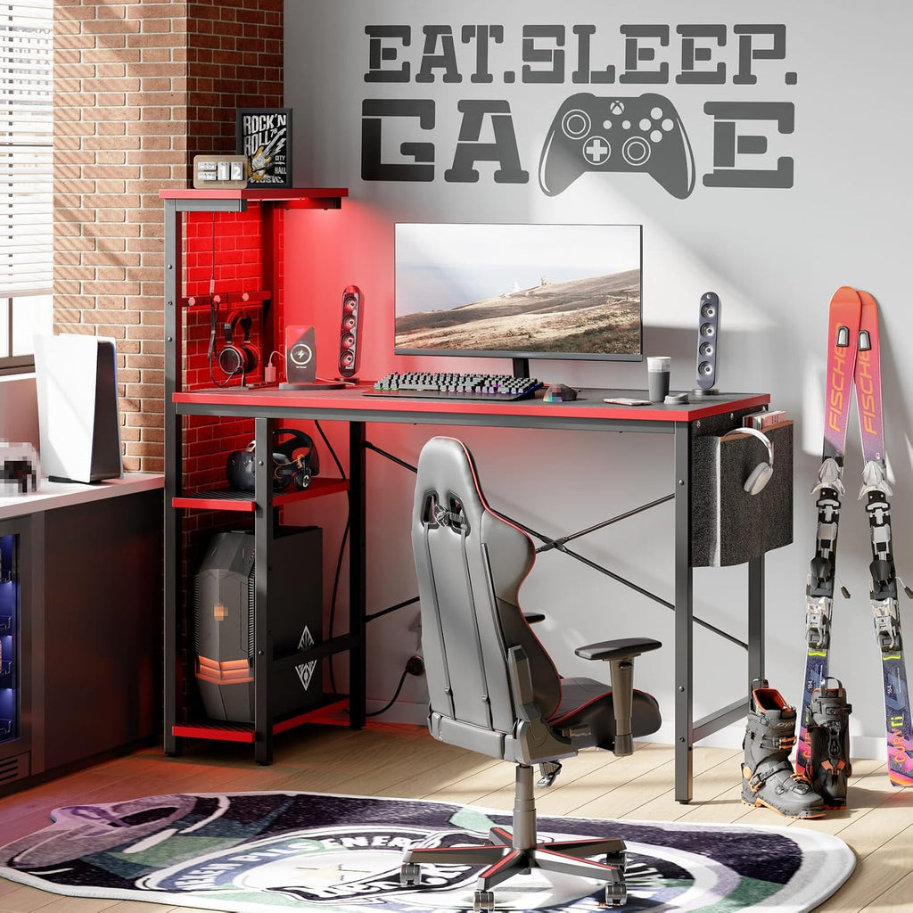Bestier Gaming Desk with Power Outlets, 44 Inch Led Gamer Desk with 4 Tiers Reversible Shelves, PC Gaming Table with Headset Hook & Side Storage Bag for Bedroom (Black 3D Carbon Fiber)